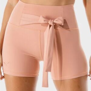 Squatwolf Tie Shorts in Peachy Keen color. Size L. Great shape!